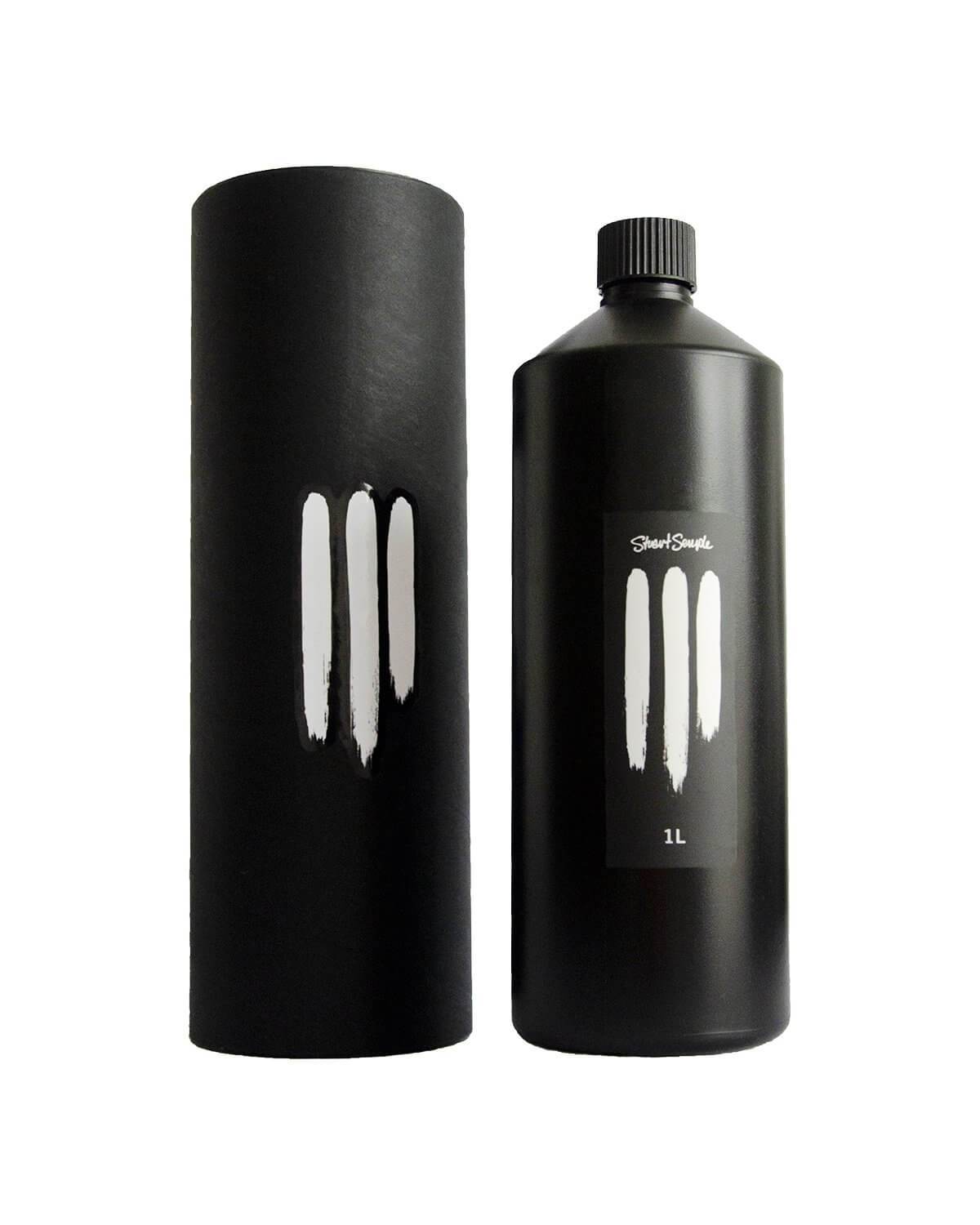 The 1 litre bottle of Black 3.0 shown with its container