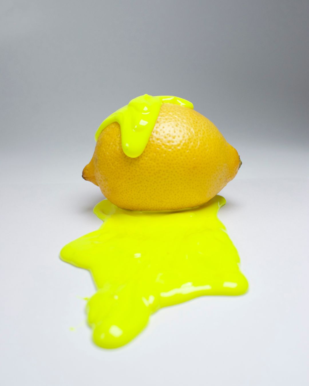 a Lemon with the lemoniest joosey paint on it