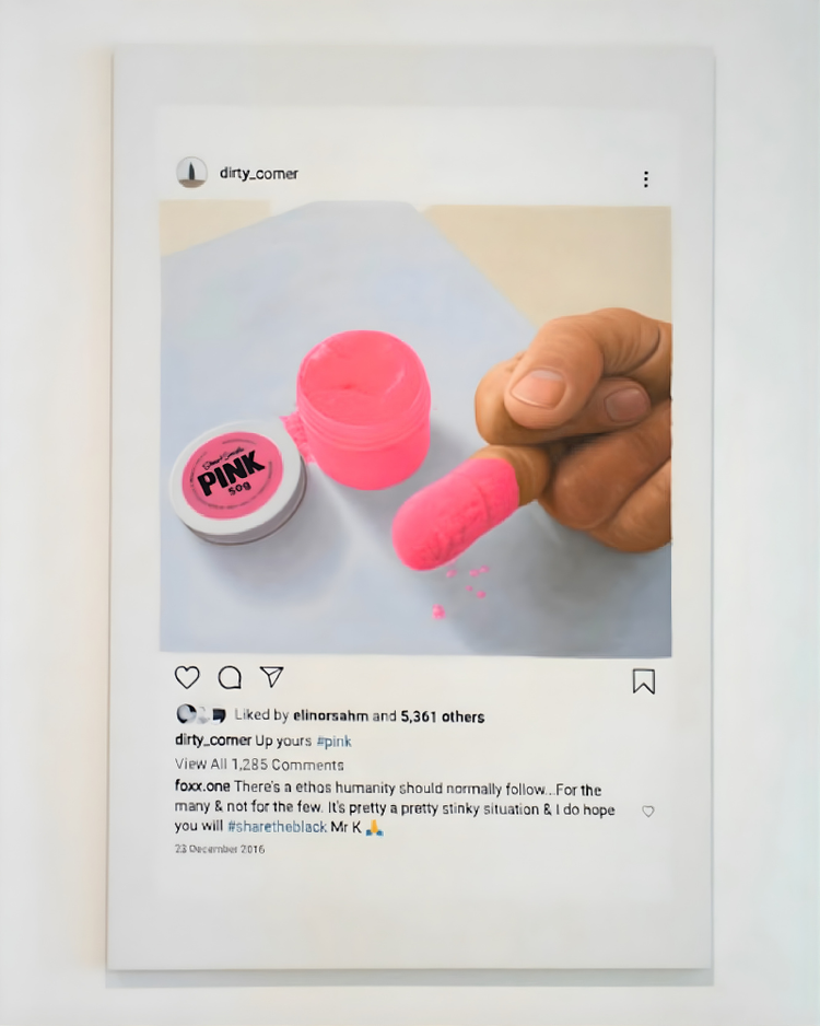 The world's pinkest pink paint in a jar, with Anish Kapoor's finger holding a pink paint blob, set against a light background.