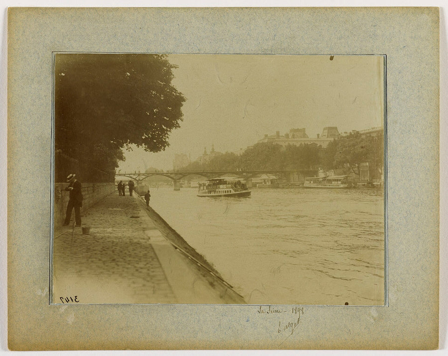 The Seine in Paris with the Pont des Arts, seen from the quai de Conti, in an old black and white photograph