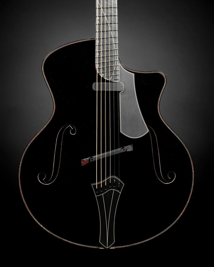 Archtop guitar body by @tikatooguitars finished in Black 4.0