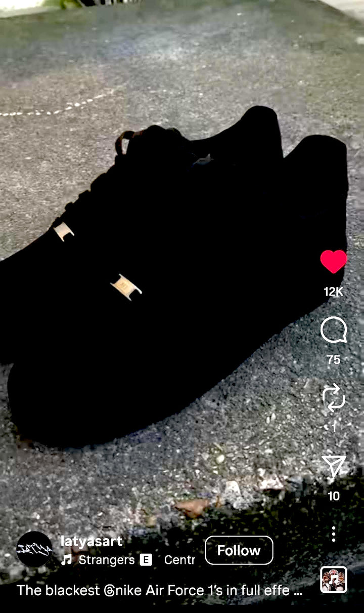 Trainers painted in Black 4.0 so they lose their shape