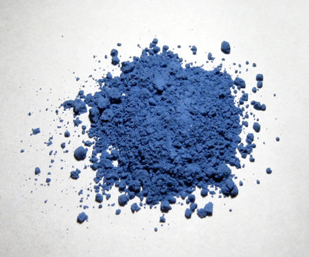 A heap of natural ultramarine pigment powder ground from lapis lazuli
